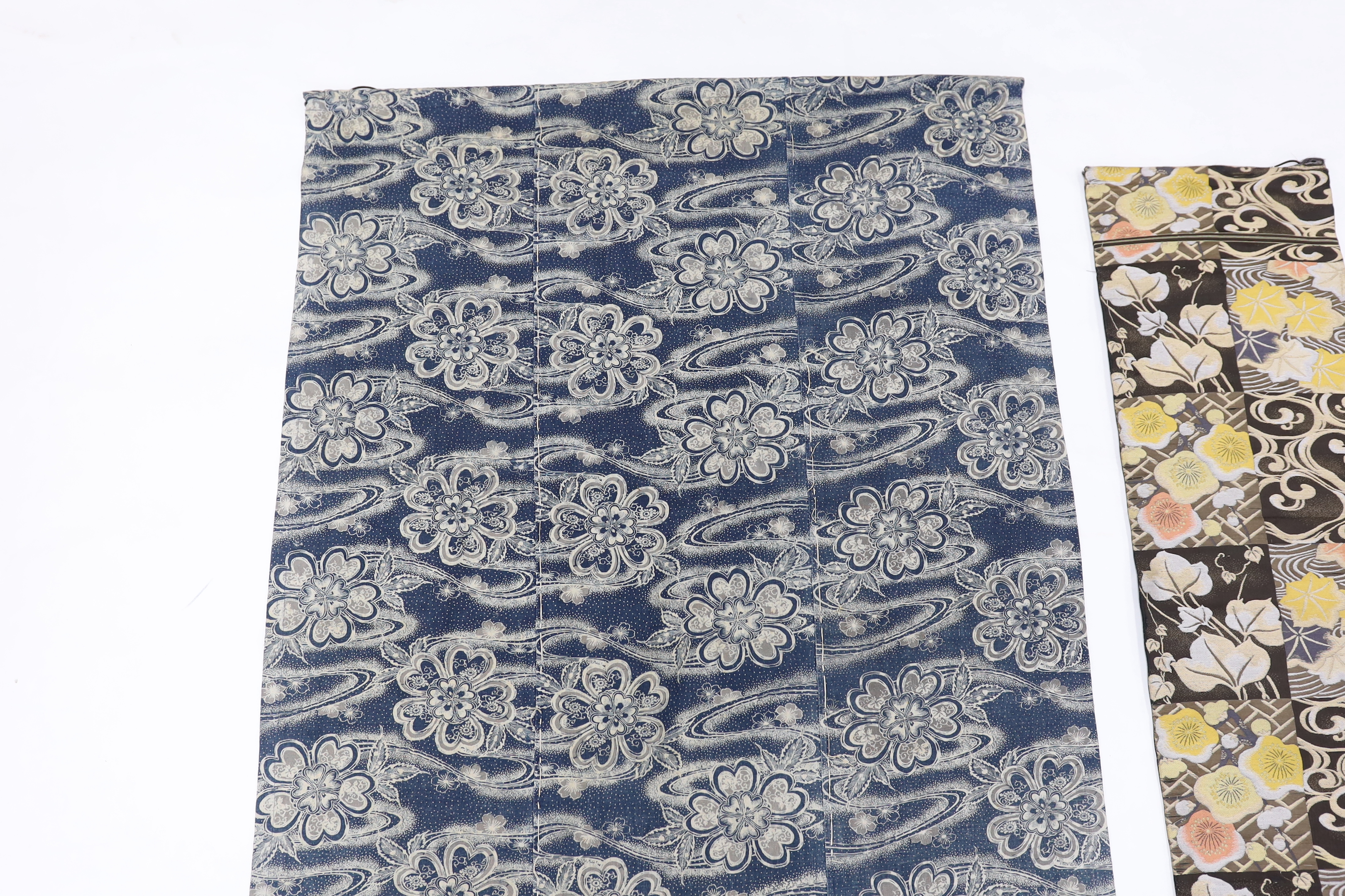 A Japanese blue-printed banner and part of a Japanese silk brocade Obi converted to a hanging, Obi 110cm long, (2)